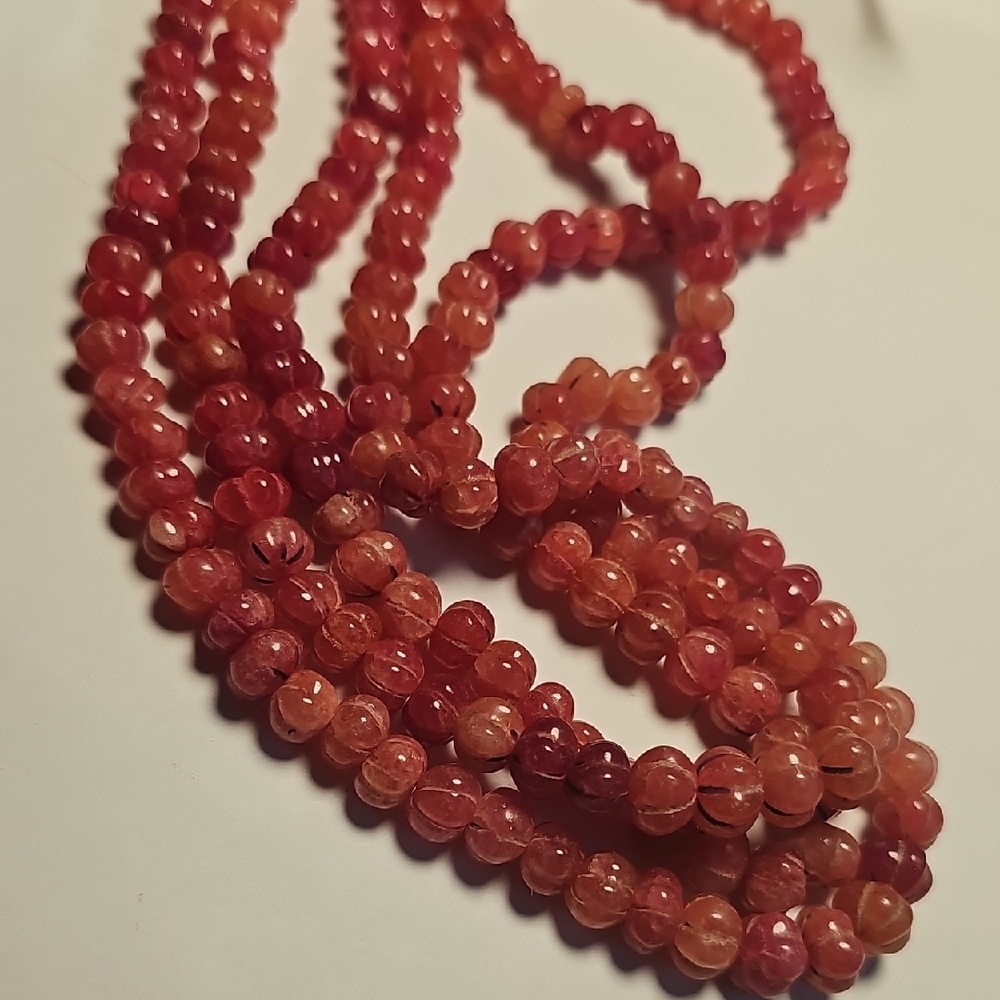Carved Cherry Quartz Triple Strand Necklace
